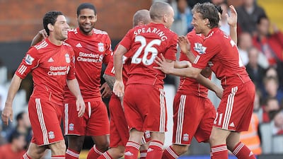 Liverpool celebrate one of their five goals against Fulham.