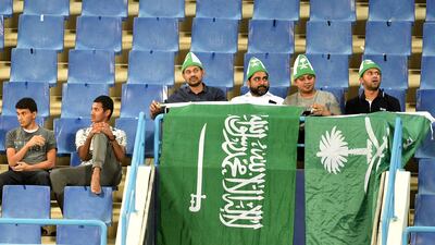 Saudi fans cheer during a friendly football match between Saudi Arabia and Iraq. AFP