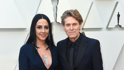 Giada Colagrande, left, and Willem Dafoe in Prada at the 91st Academy Awards. AP
