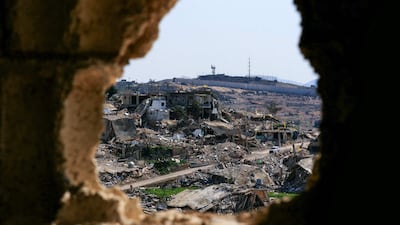 Buildings destroyed by Israeli strikes near the border wall in the southern Lebanese village of Ramia. AFP