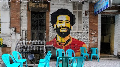 June 12, 2018- Cairo, Egypt. A mural of star footballer Mohamed Salah is painted on an alleyway in downtown Cairo. Egypt will play in the World Cup for the first time in 28 years. (Dana Smillie for The National)