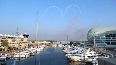 The aircraft perform a love heart over the yacht marina on Yas Island