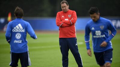 Russia head coach Leonid Slutskiy leads his team's training session, on June 6, 2016 in Croissy-sur-Seine, outside Paris. Martin Bureau / AFP