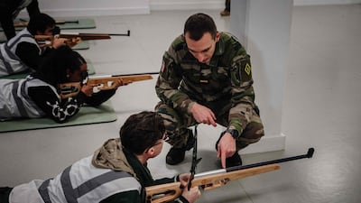 Laser gun training in Arcueil, south of Paris. President Emmanuel Macron says France is restoring military service on a voluntary basis. AFP