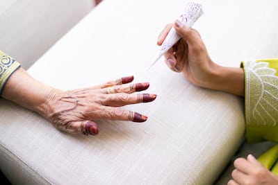 Henna is a popular way for women to celebrate Eid Al Fitr. Reem Mohammed / The National