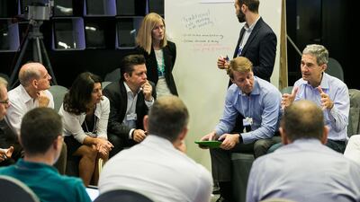 A participant discusses a point in one of the brainstorming sessions at the World Economic Forum's Summit on the Global Agenda that is being held in Abu Dhabi. Courtesy World Economic Forum