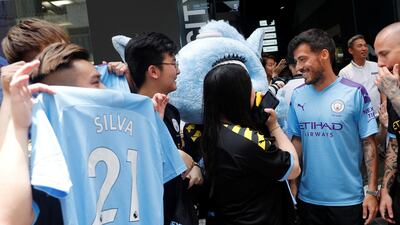 David Silva talks to fans during a promotional event for Manchester City in Hong Kong. Reuters