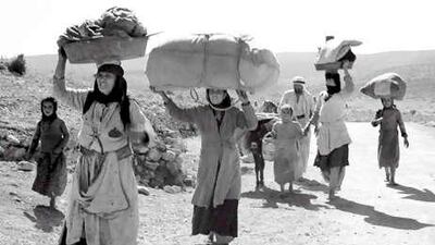 Palestinians flee to Lebanon with only what they can carry during the nakba in 1948.