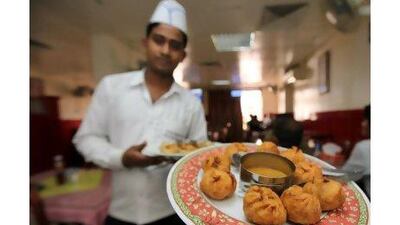 Locally owned restaurants, like the Kathmandu Highland restaurant in Bur Dubai, offer a fresh alternative to chains, readers say. (Pawan Singh / The National )