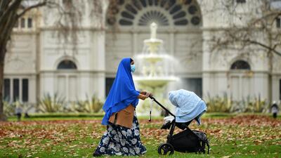 A woman wears a face mask in Melbourne, Australia. The state of Victoria recorded three new cases of coronavirus in the past 24 hours. EPA