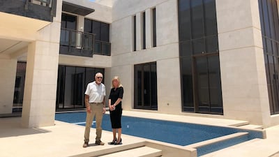 Abu Dhabi resident Sami Ghandour, from Palestine, with real estate agent Jessica Gane, is now a freehold owner of a six-bedroom villa on Saadiyat island. Courtesy: Henry Wiltshire International