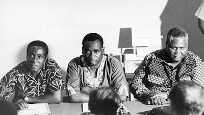 From left: Robert Mugabe, secretary for information and deputy of the African National Congress (Anc) George Silundika, and leader of the Zapu Party (Zimbabwe African People Union) Joshua Nkomo at a meeting in Dar Es Salaam, Tanzania in the 1960s. Keystone-France / Gamma-Keystone via Getty Images