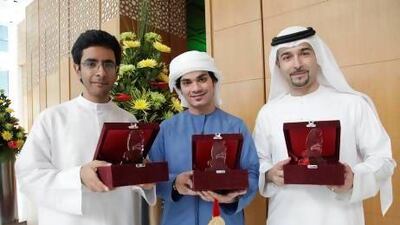 Winners of the Emirates Skills 2013 competition, Programming Category: Omar Muhairi, Abdalla Marzouqui and Professor Fadi Aloul, all from American University of Sharjah. Micaela Colace / The National
