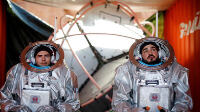 Spacesuits on for a demonstration. Reuters