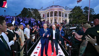 US President Donald Trump and UFC chief executive Dana White arrive for the UFC Freedom 250 mixed martial arts event on the South Lawn of the White House in Washington, US. AFP