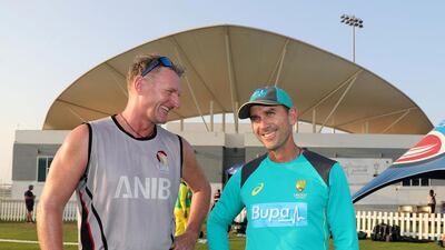 Dougie Brown, left, with Australia coach Justin Langer. Chris Whiteoak / The National