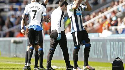 Newcastle’s Aleksandar Mitrovic is shown a red card by referee Anthony Taylor. Action Images via Reuters / Lee Smith