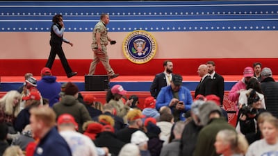 Guests begin to arrive for the relocated parade at the Capitol One Arena in Washington. EPA