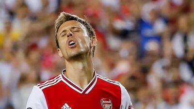 Arsenal defender Nacho Monreal reacts after missing a penalty kick. EPA
