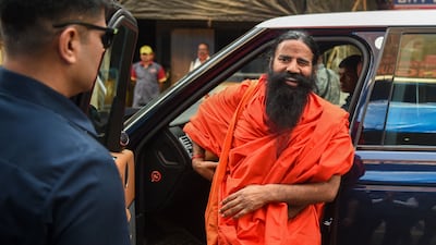 Yoga guru Ramdev arrives for the contempt hearing a the Indian Supreme Court. AFP