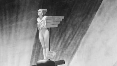 American actress Corinne Griffith dressed as the 'Spirit of Ecstasy', the emblem seen on the bonnet of Rolls-Royce cars, in 1925.