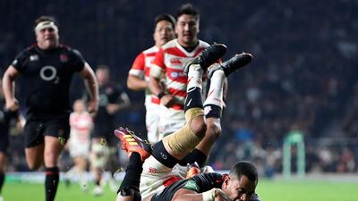 Wing Joe Cokanasiga scores England's third try against Japan at Twickenham as the hosts ran out 35-15 winners. Reuters