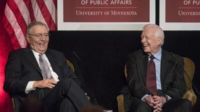 Former president Jimmy Carter, right, joins Mondale at an event hosted by the Humphrey School of Public Affairs at the University of Minnesota. Reuters