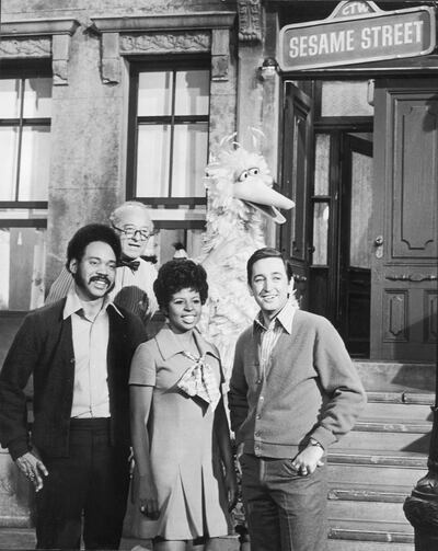 From left, Sesame Street hosts Matt Robinson (Gordon), Will Lee (Mr Hooper), Loretta Long (Susan) and Bob McGrath (Bob) with Big Bird in a promotional still on the set of the educational public television series, in 1969. Getty Images