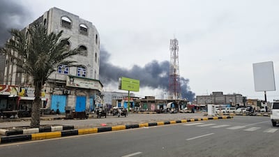 Smoke rises during Houthi missile and drone strikes on the Red Sea port city of Mokha, Yemen, on Sunday. Reuters