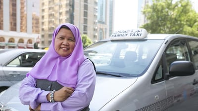 Elsa Fortuna, a driver of a family taxi operated by Emirates Taxi, said there is a need to let Abu Dhabi residents know family taxis are available. Mona Al-Marzooqi/ The National