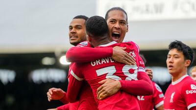 Liverpool's Ryan Gravenberch celebrates with Virgil van Dijk after scoring his side's second. AP