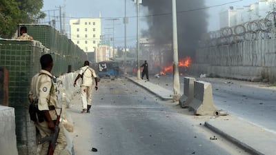 Somali security officers attempt to secure the scene of an explosion in Mogadishu, Somalia November 9, 2018. Reuters