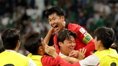 Son Heung-min of South Korea celebrates after Cho Gue-Sung scoring their equaliser. Getty Images