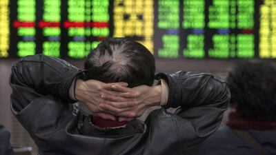 The Shanghai Composite hitting 5,000 is one of Saxo Bank's outrageous forecasts. Johannes Eisele / AFP