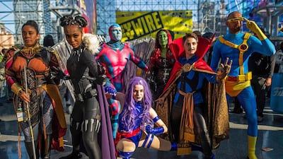 Costumed superheroes from Marvel pose during New York Comic Con. AP
