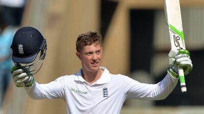 England's Keaton Jennings celebrates after scoring a century on the first day of the fourth Test cricket match between India and England at the Wankhede stadium in Mumbai on December 8, 2016. Punit Paranjpe / AFP