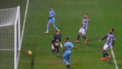 Manchester City's Raheem Sterling scores to make it 5-0. EPA