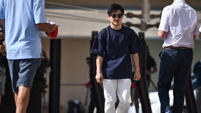 AlphaTauri's Japanese driver Yuki Tsunoda arrives before the first practice session. AFP
