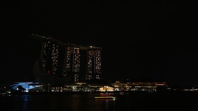 Singapore's Marina Bay Sands hotel and resort fights through the drakness during the Earth Hour. AFP
