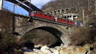 Two trains on the Gotthard train line between Bodio and Giornico, Switzerland, in 2003. Karl Mathis / EPA