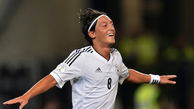 Mesut Ozil, after scoring for Germany during their World Cup-winning campaign in Brazil in 2014, announced his retirement from football on Wednesday, March 22, 2023. AP