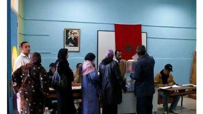 People wait to cast their ballots for the legislative election at a polling station in Casablanca Friday.
