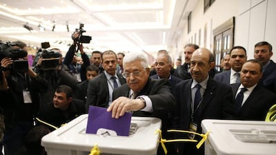 Palestinian president Mahmoud Abbas casts his vote at the Muqataa, the Palestinian Authority headquarters in the West Bank city of Ramallah, during a conference of the Fatah movement on December 3, 2016. Ahmad Gharabli / AP Photo