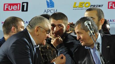 From left to right: Dagestan's acting Minister of Physical Culture and Sports, Magomed Magomedov, Khabib Nurmagomedov, and his father Abdulmanap Nurmagomedov. Reuters