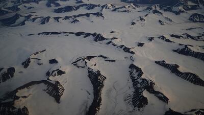 An aerial view shows snow-covered mountains in Svalbard. Reuters, file