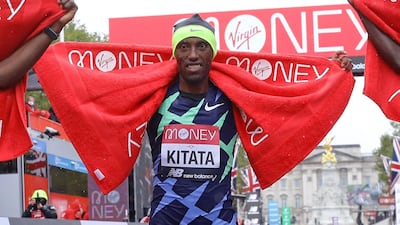 Ethiopia's Shura Kitata poses at the finish line. AFP