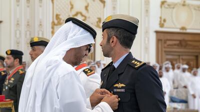 Sheikh Mohamed bin Zayed presents an Emirates Military Medals to members of the UAE Armed Forces, Ministry of Interior and Abu Dhabi Police during a Sea Palace barza.