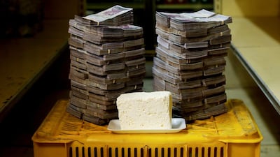 A kilogram of cheese is pictured next to 7,500,000 bolivars