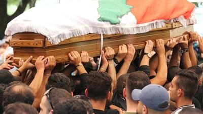 The burial of Rami Salman, one of two aides of Lebanese minister Saleh Al Gharib killed on Sunday in an alleged assassination attempt. Mohamed Azakir / Reuters