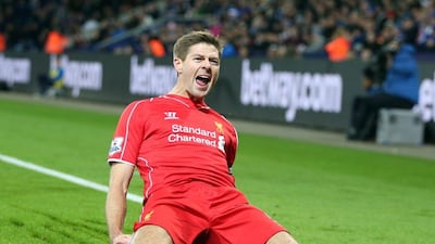 Liverpool's Steven Gerrard celebrates scoring the eventual winning goal in a 3-1 Premier League victory over Leicester City on Tuesday at the King Power Stadium. Kieran Galvin / EPA